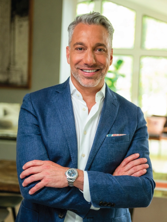 Thom Filicia crossing his arms and smiling