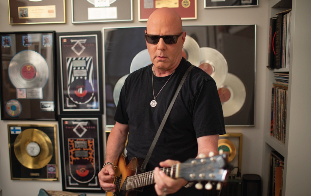 Jay Jay French plays guitar