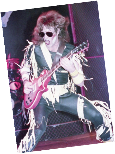 Jay Jay French plays guitar in costume for Twister Sister